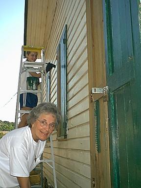 Dot and Erin touching up the church annex