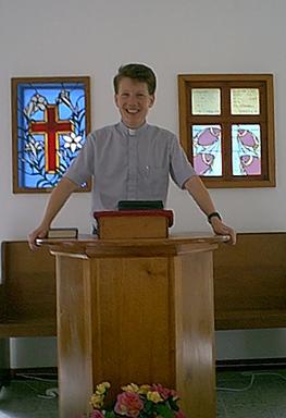 Reverend Bennett in the chapel pulpit