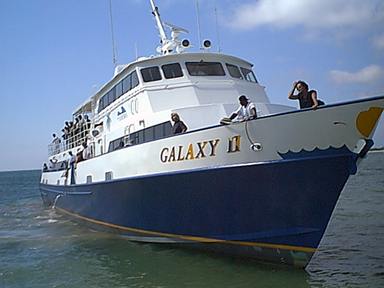 The Galaxy II approaches the Utila municipal dock