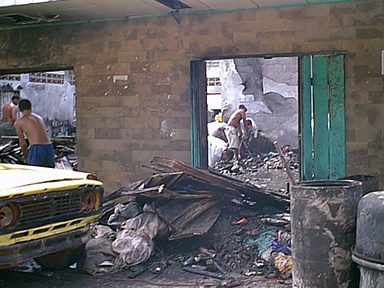 Volunteers pitch in to clean out the debris