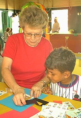 Edna assists a customer