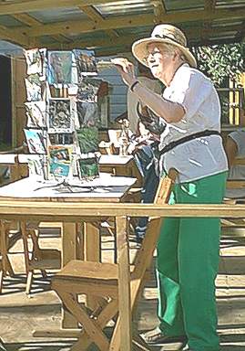 Miss Jeanette checks out some postcards